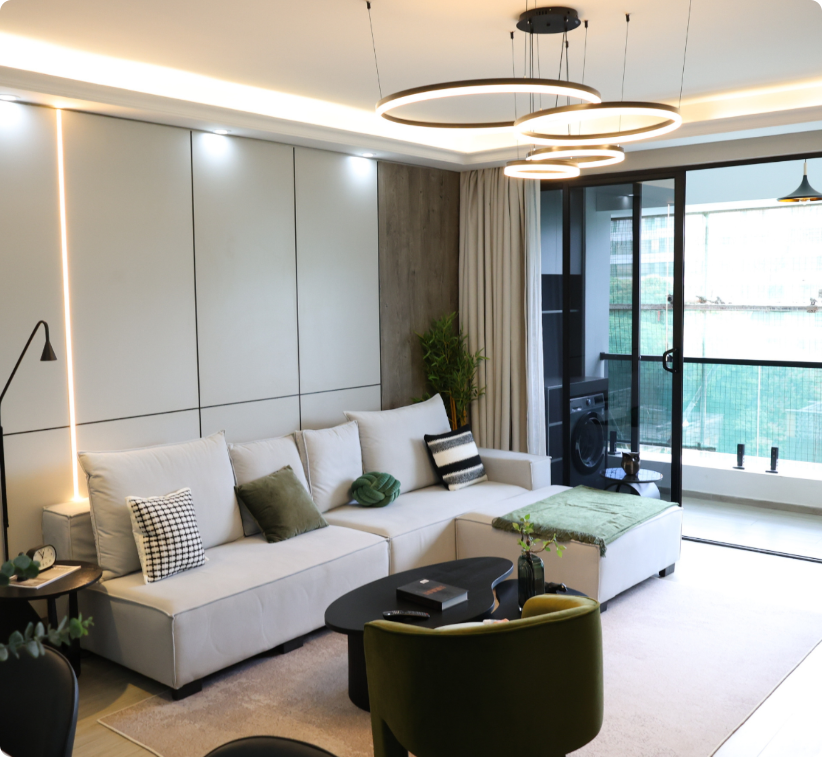 Contemporary living room with floor-to-ceiling windows and water views